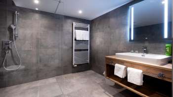 Salle de bains à l'hôtel Turna