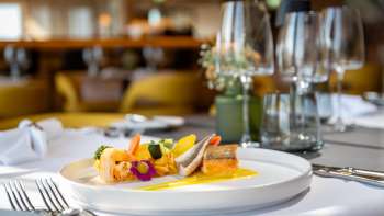 Des repas délicieux dans une atmosphère moderne et conviviale à l'Alpin Royal Restaurant